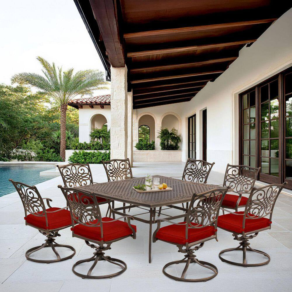 Traditions 9-Piece Aluminum Outdoor Dining Set with Swivel Rockers with Red Cushions