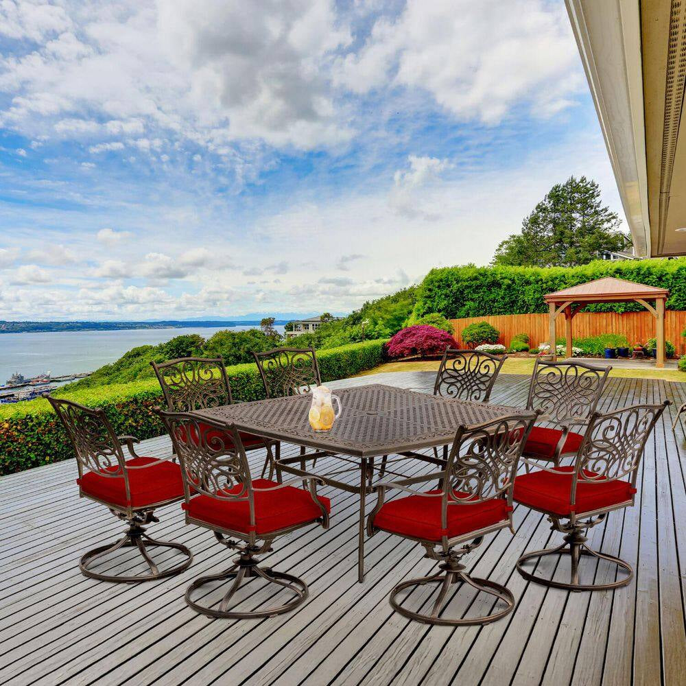 Traditions 9-Piece Aluminum Outdoor Dining Set with Swivel Rockers with Red Cushions